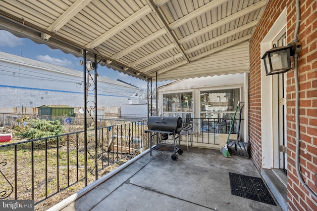 view of patio with a balcony and area for grilling