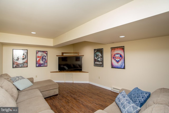 living room featuring recessed lighting, baseboards, and dark wood-style flooring