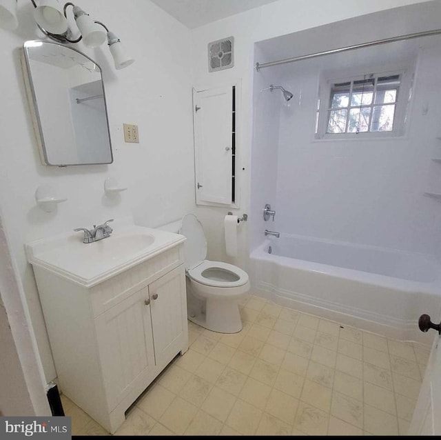 bathroom with vanity, visible vents, bathtub / shower combination, tile patterned floors, and toilet