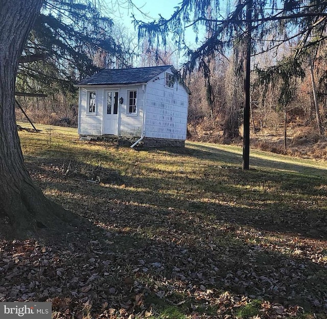 view of outbuilding with an outdoor structure