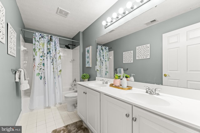 full bathroom with shower / bath combination with curtain, visible vents, and a sink
