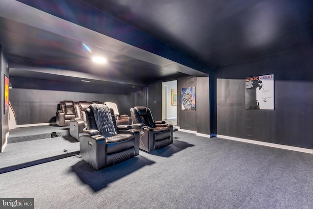 carpeted cinema featuring baseboards
