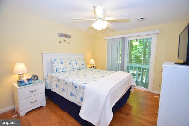 bedroom featuring access to exterior, light wood-style flooring, baseboards, and ceiling fan