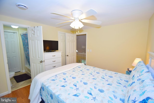 bedroom with ceiling fan and wood finished floors