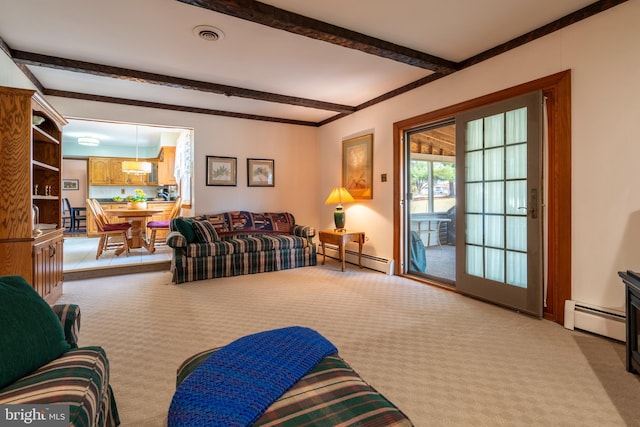 living area featuring beam ceiling, a baseboard heating unit, and carpet floors