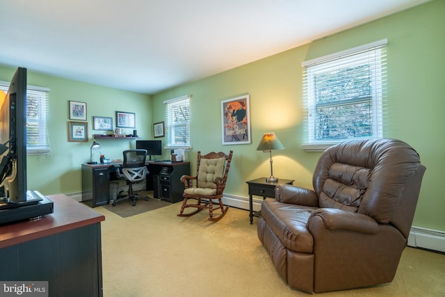 home office featuring a baseboard radiator, light carpet, and baseboards