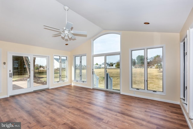 unfurnished sunroom featuring visible vents, lofted ceiling, and ceiling fan