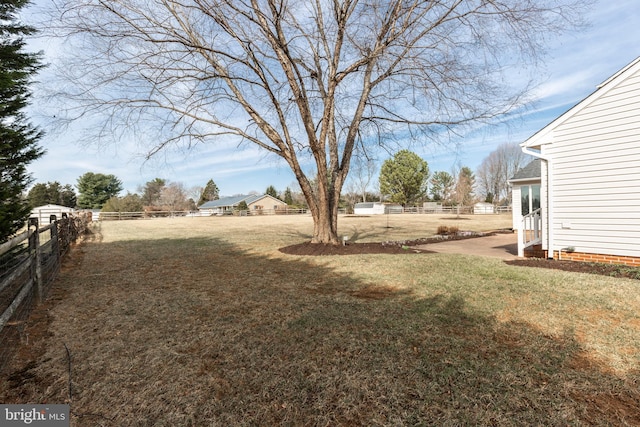 view of yard with a patio area and fence