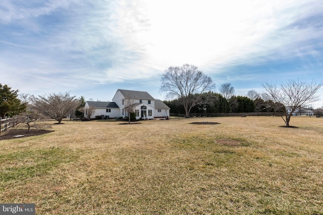 view of yard featuring fence