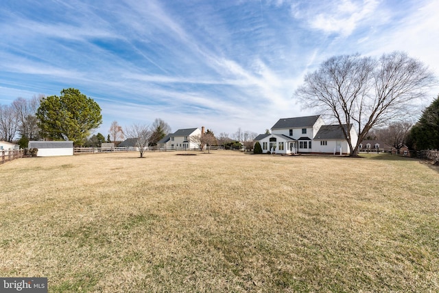 view of yard with fence