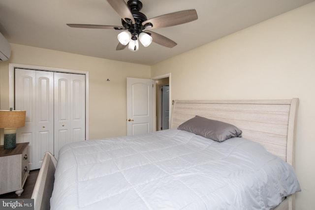 bedroom with a closet, ceiling fan, and wood finished floors