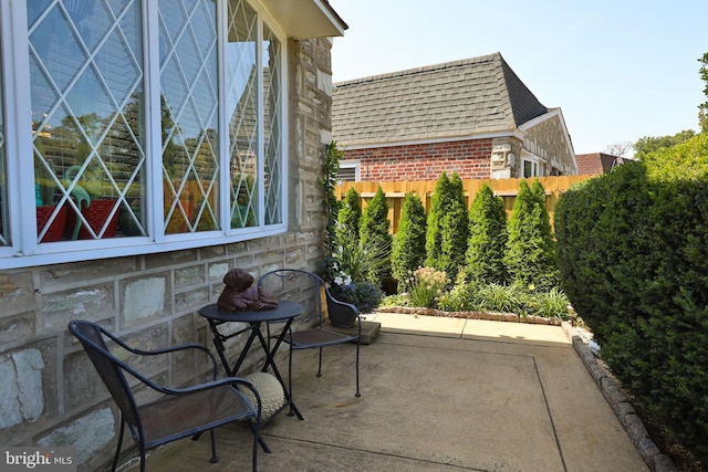 view of patio / terrace with fence