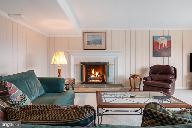 living room with a brick fireplace and crown molding