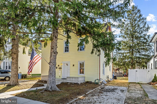 view of front of home with fence