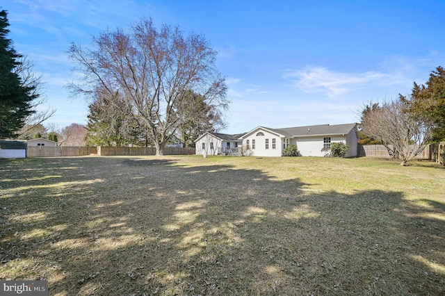 view of yard featuring fence