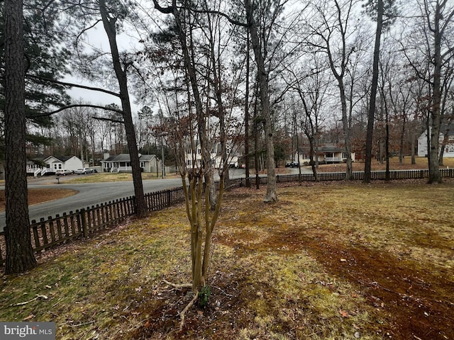 view of yard featuring a residential view