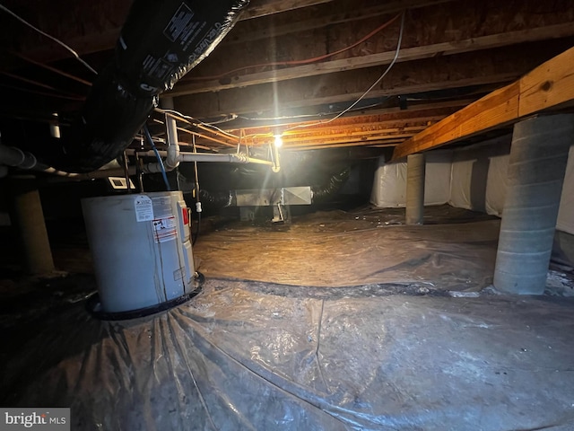 basement featuring water heater and crawl space