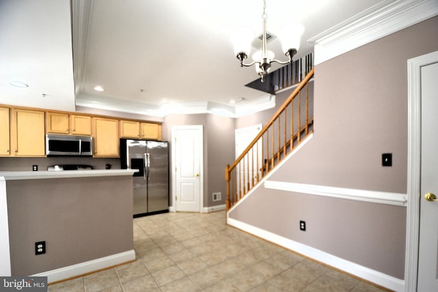 kitchen featuring recessed lighting, stainless steel appliances, baseboards, and crown molding