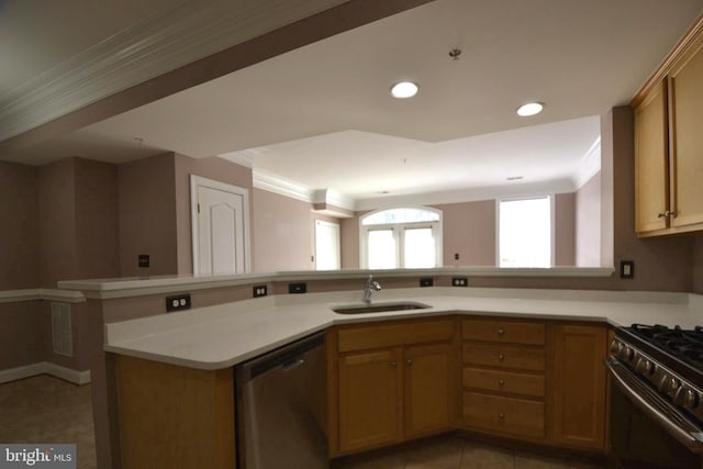 kitchen featuring ornamental molding, a sink, range with gas stovetop, stainless steel dishwasher, and light countertops