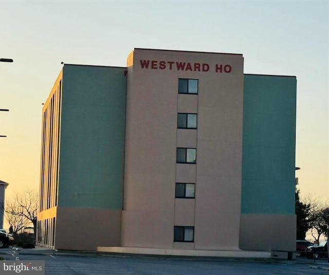 view of property at dusk