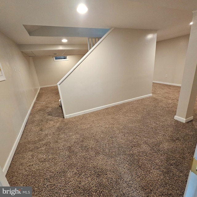 finished basement with recessed lighting, baseboards, and carpet