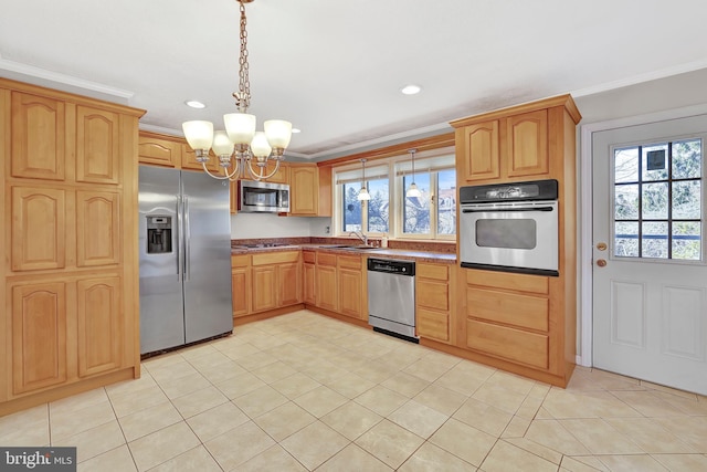 kitchen featuring pendant lighting, a sink, appliances with stainless steel finishes, an inviting chandelier, and crown molding