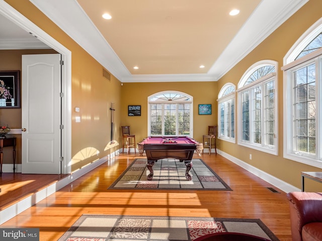 recreation room featuring visible vents, wood finished floors, ornamental molding, and billiards