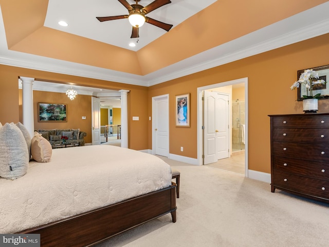 bedroom with baseboards, a tray ceiling, decorative columns, recessed lighting, and light colored carpet