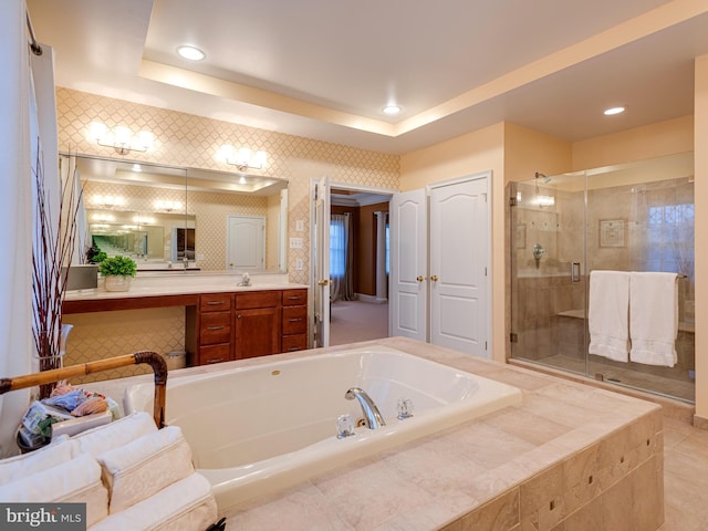 full bathroom featuring vanity, a garden tub, recessed lighting, and a shower stall