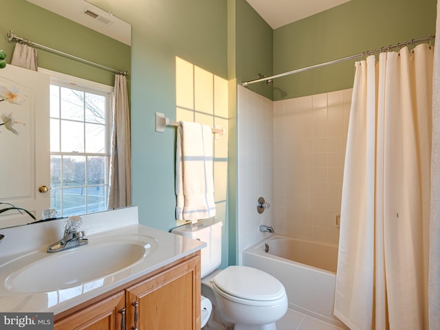 full bath with visible vents, shower / bath combination with curtain, toilet, and vanity