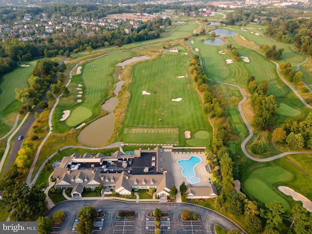 birds eye view of property featuring view of golf course