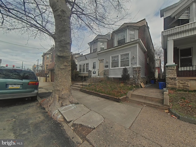 view of new england style home