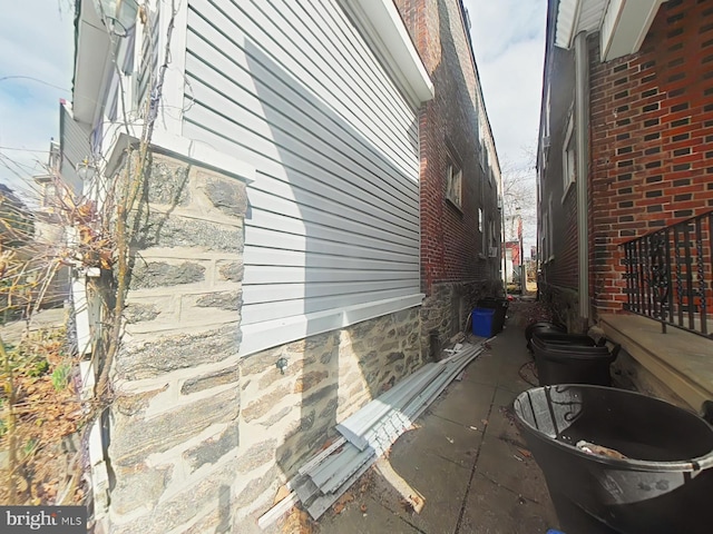 view of home's exterior featuring brick siding