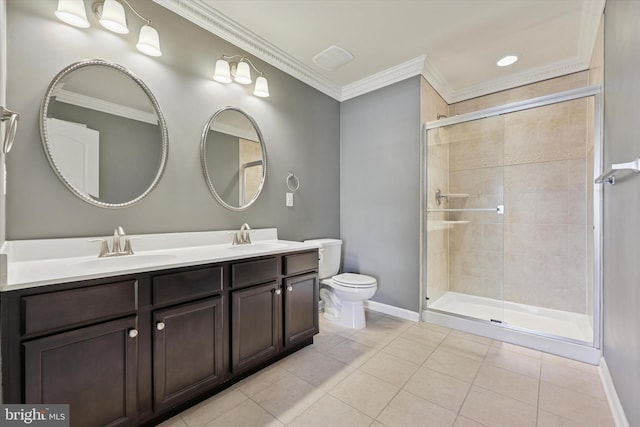 full bathroom featuring a tile shower, ornamental molding, toilet, and a sink