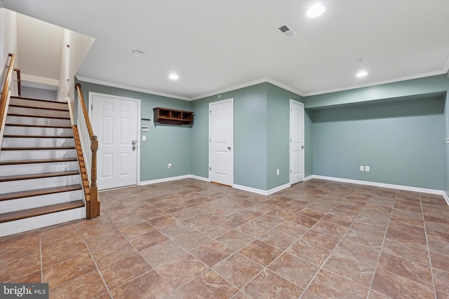 basement with stairway, baseboards, and visible vents