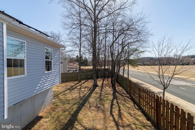 view of yard featuring fence