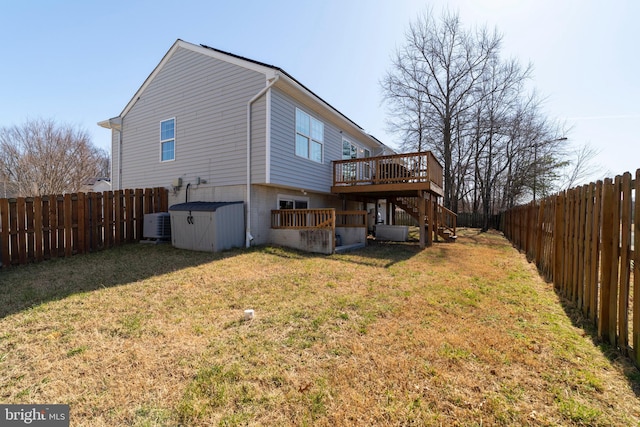 rear view of property featuring stairs, cooling unit, a yard, a deck, and a fenced backyard