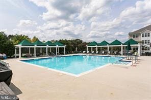 pool with a patio