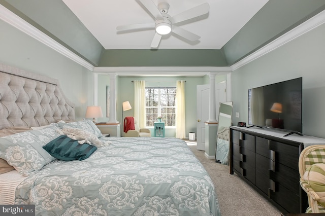 carpeted bedroom featuring ornate columns and ceiling fan