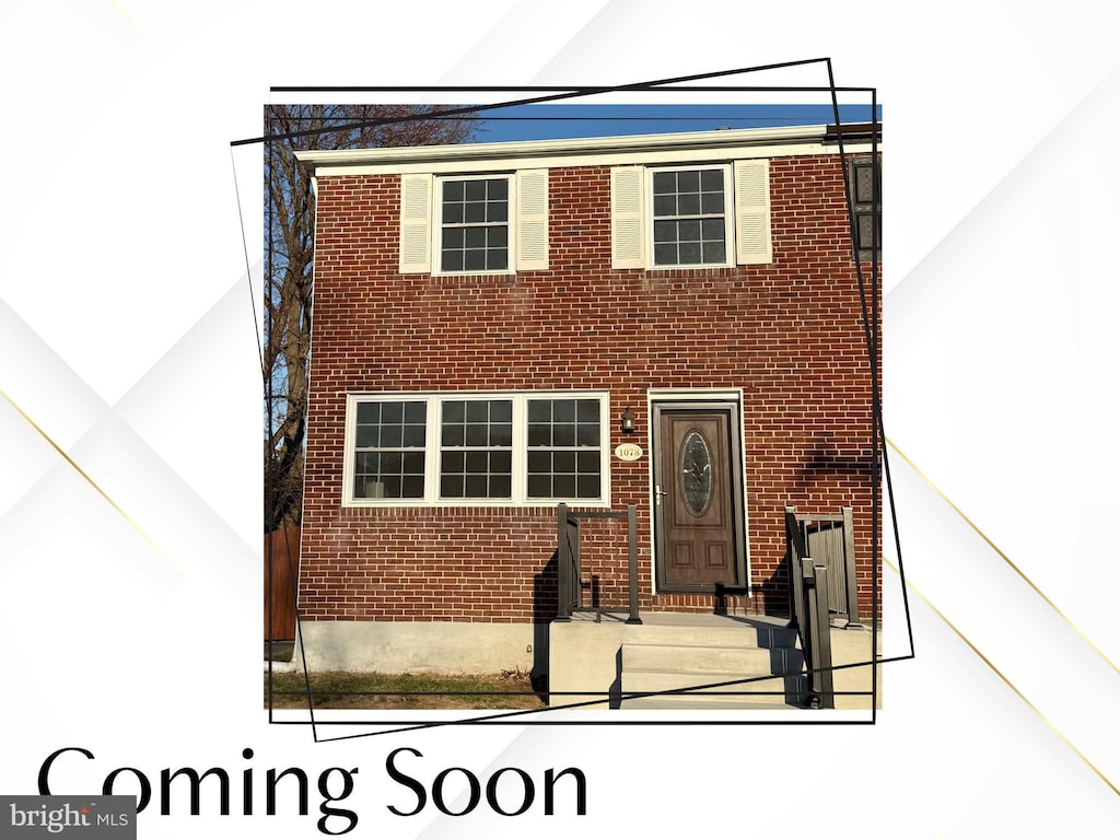 view of front of property with brick siding