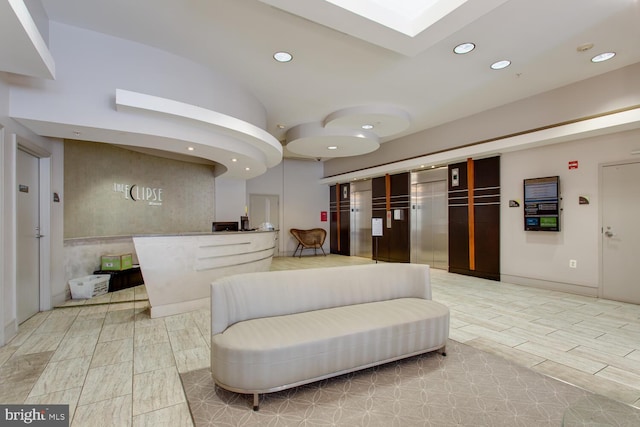 reception area featuring a skylight