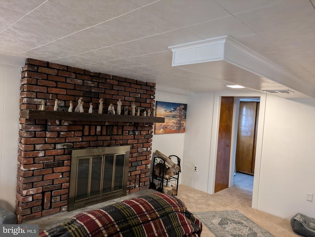 living area featuring carpet and a brick fireplace