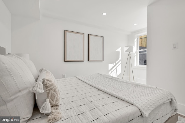 bedroom featuring recessed lighting