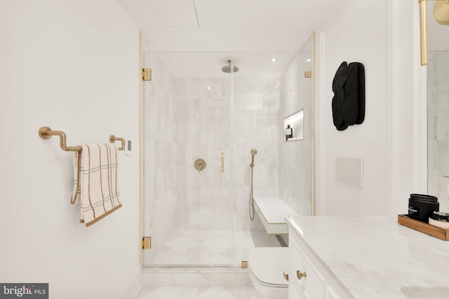 full bath with toilet, marble finish floor, a marble finish shower, baseboards, and vanity