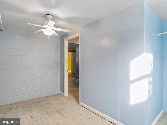 unfurnished bedroom featuring carpet flooring and baseboards