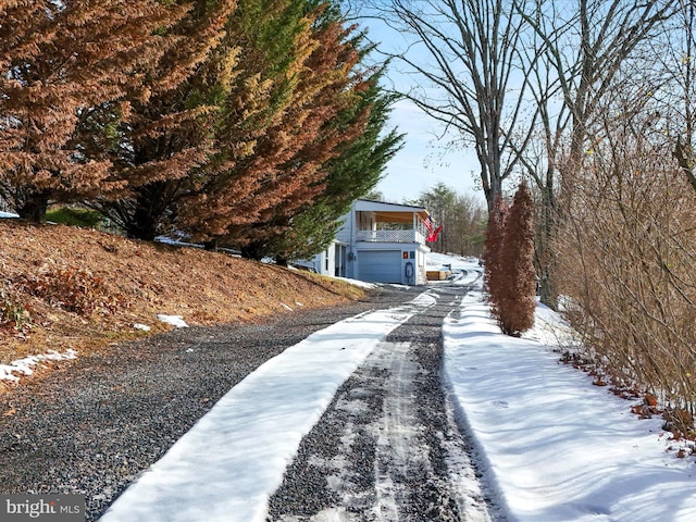 view of yard layered in snow