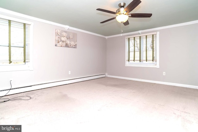 empty room featuring a baseboard heating unit, a healthy amount of sunlight, and ornamental molding