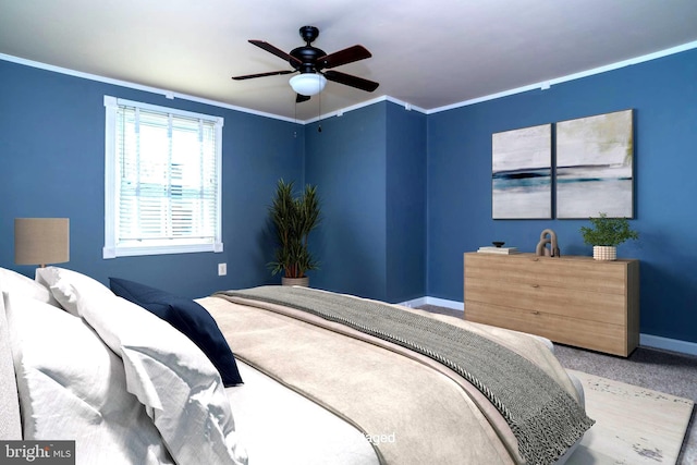 bedroom featuring crown molding, baseboards, and ceiling fan