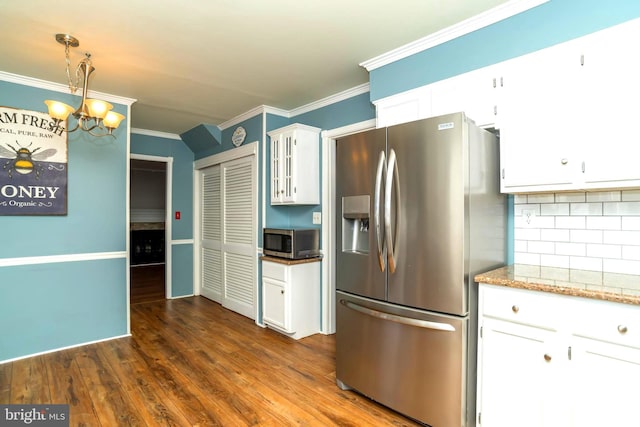 kitchen with white cabinetry, dark wood-style floors, and stainless steel appliances