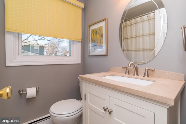 full bathroom with baseboard heating, toilet, and vanity